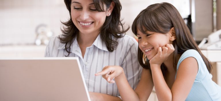 two people on computer