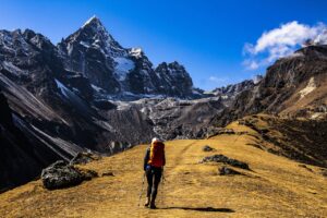 "person hiking in mountains"